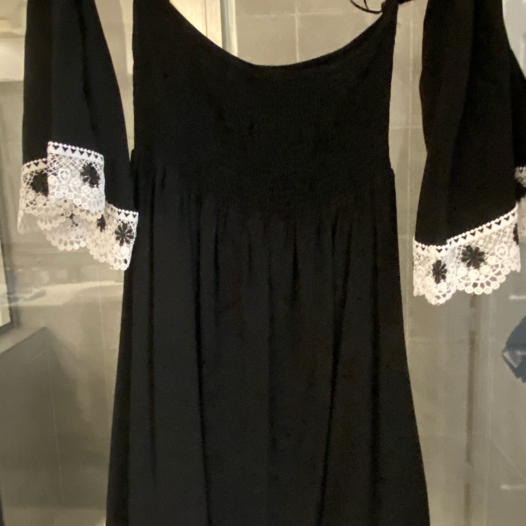 Has Cut Out Shoulder With Lace On Bottom & Sleeves